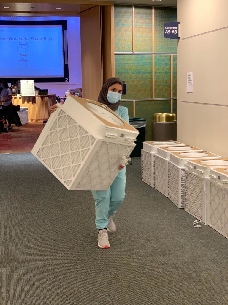 medicine-2021-12-04-2 female carrying DIY filter photo