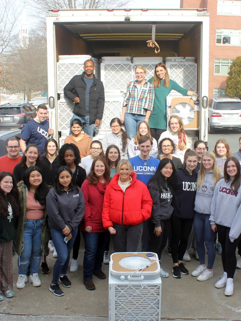 mar-2022-4 students and staff posing